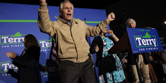 Democratic gubernatorial candidate, former Virginia Gov. Terry McAuliffe celebrates after delivering remarks at a campaign event at Caboose Commons on November 1, 2021 in Fairfax, Virginia. (Photo by Win McNamee/Getty Images)