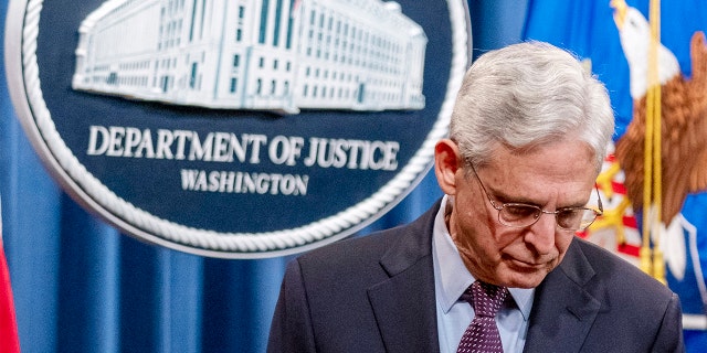 Attorney General Merrick Garland steps away from a podium after speaking at a news conference at the Justice Department in Washington, DC, Nov.  8, 2021.