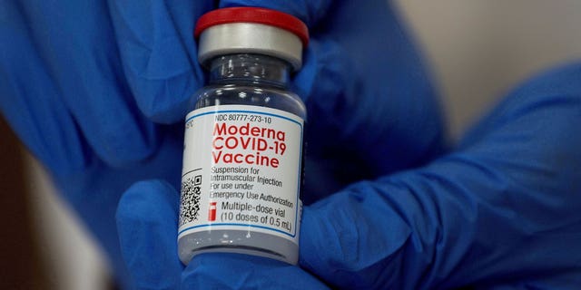 An employee is showing the Moderna COVID-19 vaccine at the Long Island Jewish Valley Stream Hospital in Northwell Health, New York.