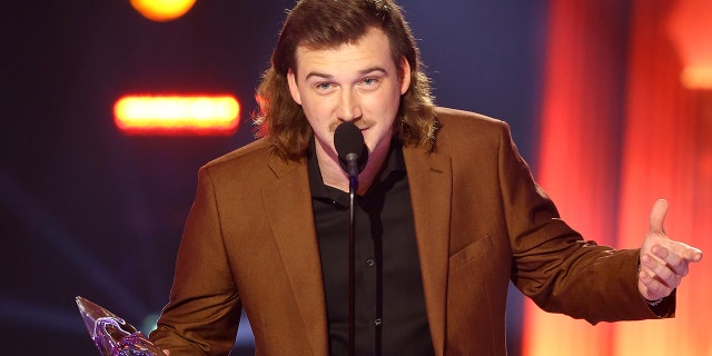 Morgan Wallen accepts an awardduring th e 54th Annual CMA Awards at Nashville’s Music City Center on Nov. 11, 2020.