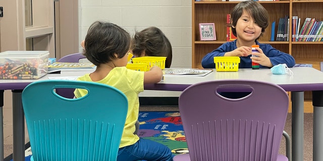 Muzghan with her sisters at school.