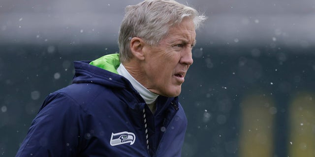 Seattle Seahawks head coach Pete Carroll looks over Lambeau Field before an NFL football game against the Green Bay Packers Sunday, Nov. 14, 2021, in Green Bay, Wis.