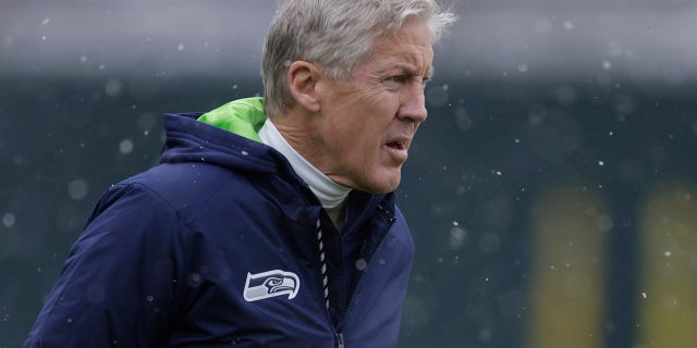 Seattle Seahawks head coach Pete Carroll looks over Lambeau Field before an NFL football game against the Green Bay Packers Sunday, Nov. 14, 2021, in Green Bay, Wis.