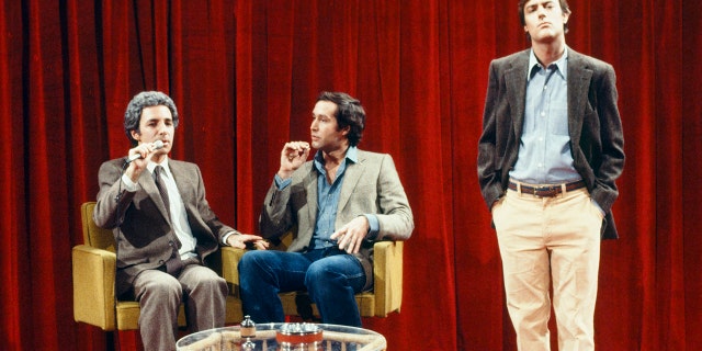 Harry Shearer as Mr. Blackwell, Chevy Chase and Peter Aykroyd as model during the "Speaking of Fashion...and other things" skit on Feb. 9, 1980.