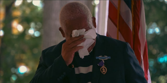 John Spencer Jr. given a Purple Heart, the Combat Infantryman Badge and the Republic of Vietnam Gallantry Cross at the University of North Carolina School of Law for his service. 