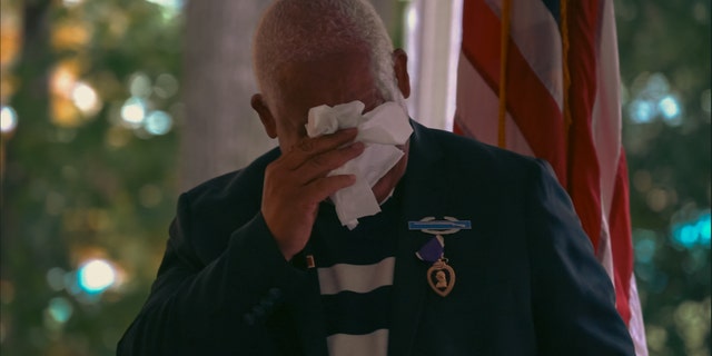 John Spencer Jr. given a Purple Heart, the Combat Infantryman Badge and the Republic of Vietnam Gallantry Cross at the University of North Carolina School of Law for his service.