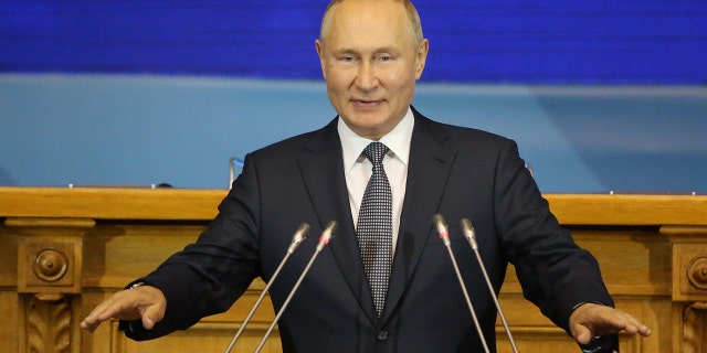 Russian President Vladimir Putin speaks during the 3rd Eurasian Women's Forum (EAFW) plenary meeting on Oct. 14 in Saint Petersburg, Russia. Recently, Putin spoke about building up the country's defense amid NATO's military activities near Russia's borders.