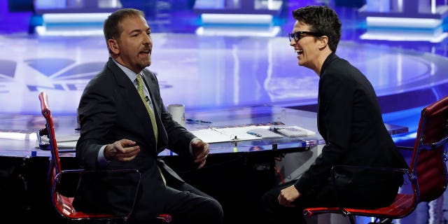 MSNBC debate moderators Chuck Todd and Rachel Maddow speak to the audience during the first U.S. 2020 presidential election Democratic candidates debate in Miami, Florida, U.S., June 26, 2019.