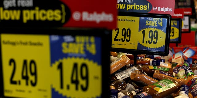 FILE PHOTO: Price tags are pictured at a Ralphs grocery store, which is owned by Kroger Co, ahead of company results in Pasadena, California U.S., December 1, 2016. REUTERS/Mario Anzuoni/File Photo