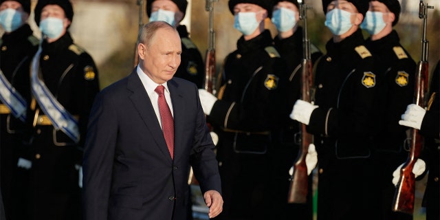 Russian President Vladimir Putin attends a flower-laying ceremony at the Russian Civil War memorial on Unity Day, in Sevastopol, Crimea, on Nov. 4, 2021. (MIKHAIL METZEL/SPUTNIK/AFP via Getty Images)