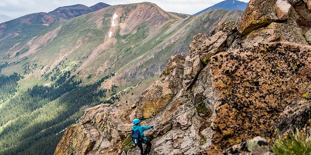 Guests enjoy the highest Via Ferrata in North America at Arapahoe Basin Ski Area, topping outat 12, 999 feet, located in Summit County, Colorado. July 2021.