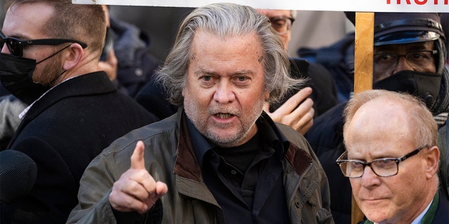 Steve Bannon, left, former advisor to President Trump, and his attorney David Schoen address the media after an appearance at the E. Barrett Prettyman Federal Courthouse on contempt of Congress charges for failing to comply with a subpoena from the committee investigating the January 6th riot, on Monday, Nov. 15, 2021. 