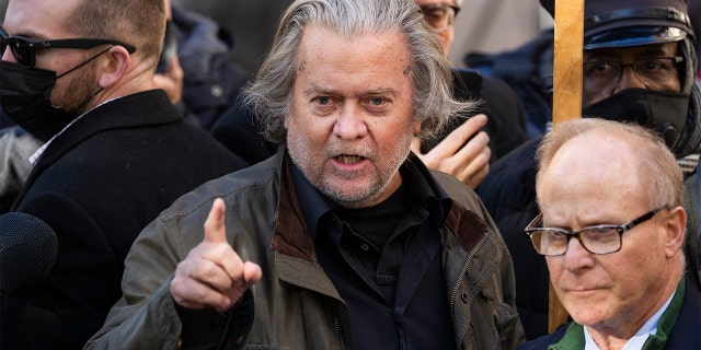 Steve Bannon, left, former advisor to President Donald Trump, and his attorney David Schoen, address the media after an appearance at the E. Barrett Prettyman Federal Courthouse on contempt of Congress charges for failing to comply with a subpoena from the Committee investigating the January 6th riot, on Monday, November 15, 2021. (Photo By Tom Williams/CQ-Roll Call, Inc via Getty Images)