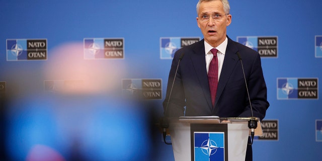 NATO Secretary General Jens Stoltenberg speaks to the press ahead of a meeting of NATO Foreign Affairs Ministers to be held on Nov. 30-Dec.1, at the NATO headquarters, in Brussels, Belgium, Friday, Nov. 26, 2021.
