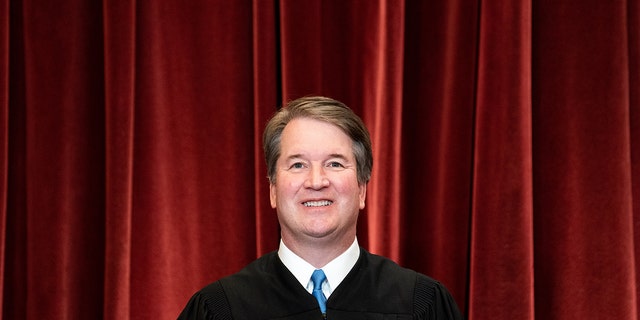 Justice Brett Kavanaugh, at the Supreme Court's group photo session in Washington on April 23, had previously agreed with the decision not to take up a particular appeal about New York gun regulations.