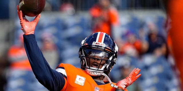 Denver Broncos quarterback Teddy Bridgewater, #5, warms up prior to an NFL football game against the Philadelphia Eagles, Sunday, Nov. 14, 2021, in Denver.