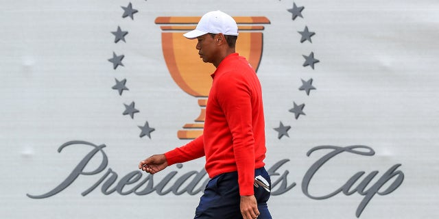 Tiger Woods the playing captain of the United States Team walks to the first tee during the final day singles matches in the 2019 Presidents Cup at Royal Melbourne Golf Club on Dec. 15, 2019 in Melbourne, Australia.