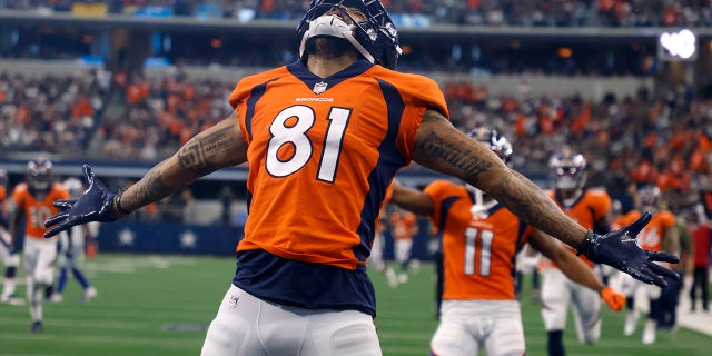 Denver Broncos wide receiver Tim Patrick celebrates catching a touchdown pass against the Dallas Cowboys in Arlington, Texas, Nov. 7, 2021.