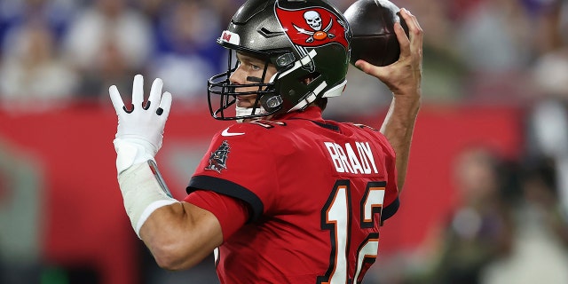 Tampa Bay Buccaneers quarterback Tom Brady (12) throws a pass against the New York Giants during the first half of an NFL football game Monday, Nov. 22, 2021, in Tampa, Fla.