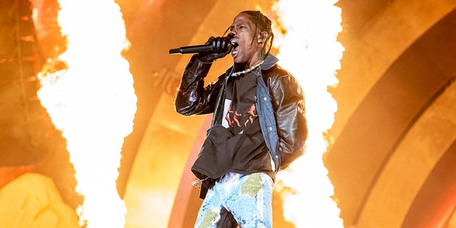 Rapper Travis Scott performs onstage at Astroworld music festival in Houston, which authorities called a "mass casualty incident" after a deadly crowd surge.
