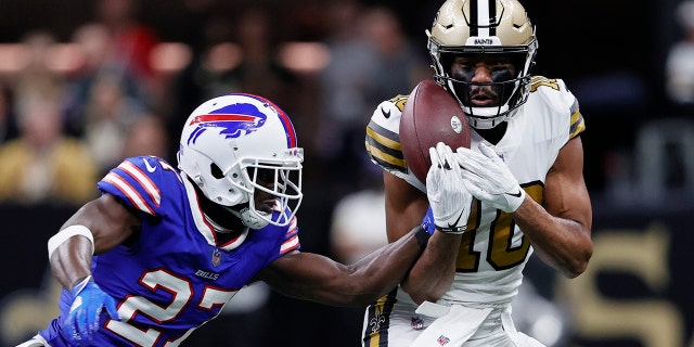 Buffalo Bills cornerback Tre'Davious White (27) defends a pass against New Orleans Saints wide receiver Tre'Quan Smith (10) in the first half of an NFL football game in New Orleans, Thursday, Nov. 25, 2021.