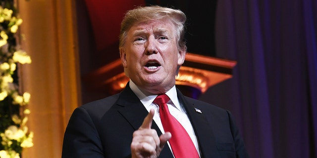 Former President Donald Trump arrives to speak at the National Republican Congressional Committee's annual spring dinner in Washington, April 2, 2019.
