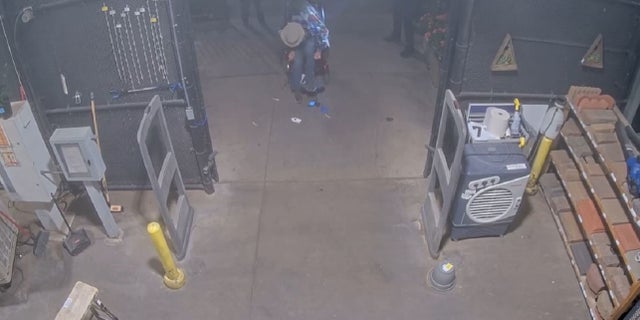 Lowe's security footage shows Richards in his wheelchair before he was shot.