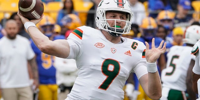 Miami quarterback Tyler Van Dyke (9) throws a pass against Pittsburgh during the first half of an NCAA college football game, Saturday, Oct. 30, 2021, in Pittsburgh.