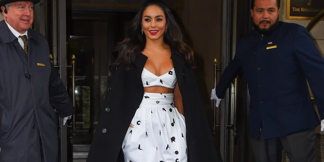 Vanessa Hudgens seen in Manhattan sporting a Valentino overcoat and black-and-white look from the Carolina Herrera Spring 2022 collezione.