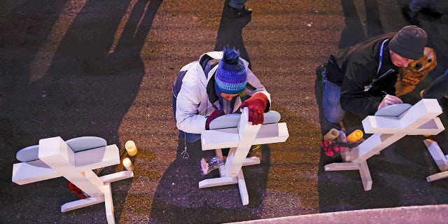 Joni Ernst slams progressive criminal reform policies: 'Stop playing politics' 4 People write messages on crosses before a candle light vigil in downtown Waukesha, Wisconsin, on Nov. 22, 2021, after an SUV plowed into a Sunday Christmas parade killing multiple people and injuring dozens. (AP Photo / Jeffrey Phelps)