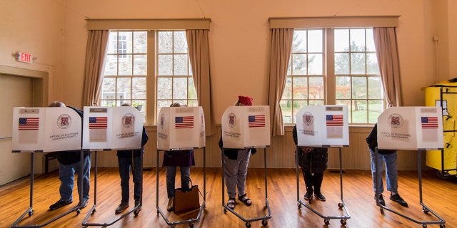 Georgia's voter law restricts when and where voters can be approached on election day.