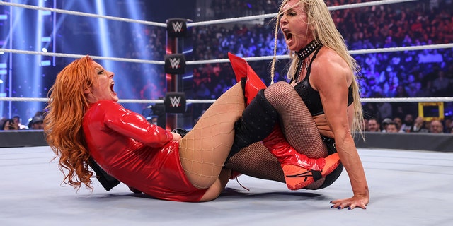 Becky Lynch and Charlotte Flair at Survivor Series 2021