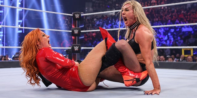 Becky Lynch and Charlotte Flair at Survivor Series 2021