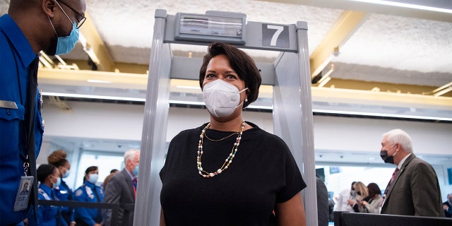 D.C. Mayor Muriel Bowser is screened during a dedication ceremony for Project Journey, a new 14-gate concourse to replace Gate 35x and two new security checkpoints, at Reagan National Airport in Arlington, Va., on Wednesday, Oct. 13, 2021. (Photo By Tom Williams/CQ-Roll Call, Inc via Getty Images)