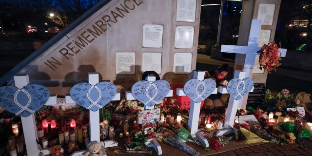 A memorial at Veterans Park for the victims of Sunday's deadly Christmas parade crash in Waukesha, Wisconsin.