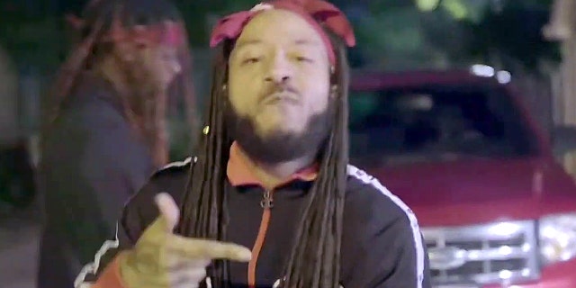 Screengrab from Brooks' "HALF A TIKKET" music video.