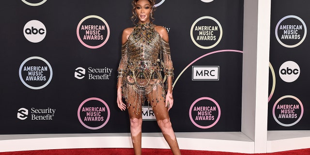 Winnie Harlow arrives at the American Music Awards on Sunday, Nov. 21, 2021, at Microsoft Theater in Los Angeles.