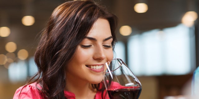 woman drinking glass of wine