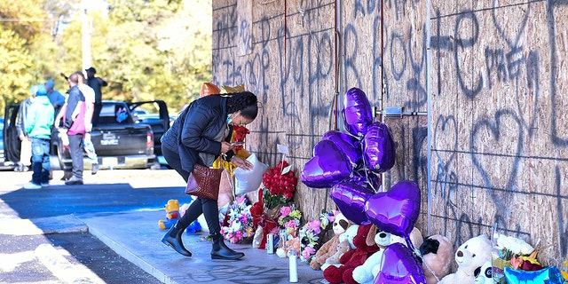 Fans of Young Dolph set up a memorial outside of Makeda's Cookies bakery on November 18, 2021 in Memphis, Tennessee. Rapper Young Dolph, born as Adolph Thorton Jr., was killed at the age of 36 in a shooting at Makeda's Cookies bakery on November 17th in Memphis. (Photo by Justin Ford/Getty Images)