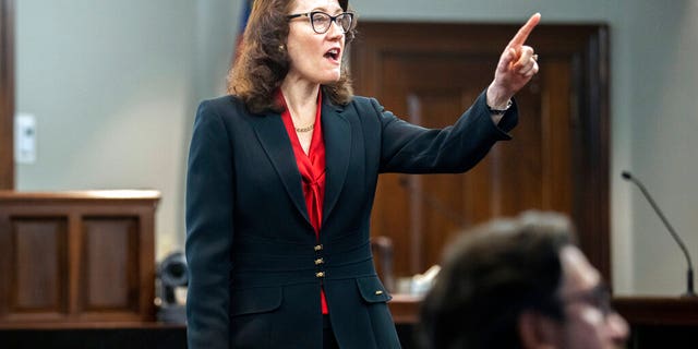 Prosecutor Linda Dunikoski presents a closing argument to the jury during the trial of Travis McMichael, his father, Gregory McMichael, and William "Roddie" Bryan, at the Glynn County Courthouse, Monday, Nov. 22, 2021, in Brunswick, Ga.  