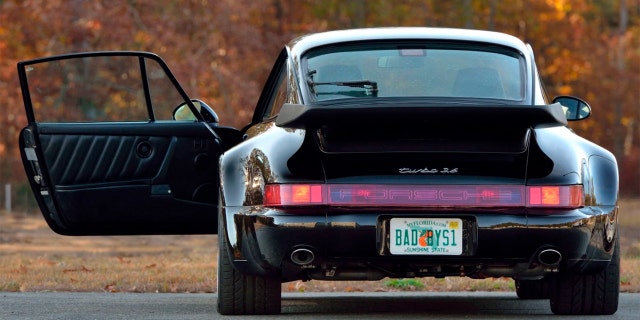 Die 911 Turbo is currently registered in Florida with a BADBYS1 license plate.