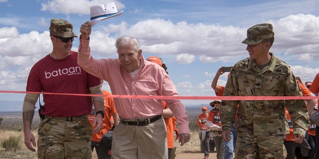 Skardon crosses the 8.5-mile finish line of the Bataan Memorial Death March at White Sands Missile Range, N.M., in 2018. 