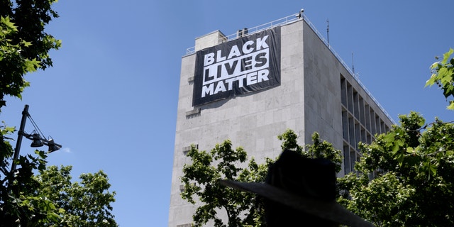 A banner in support of the Black Lives Matter movement on the building of the U.S. Embassy in Spain, on May 25, 2021, in Madrid, Spain.