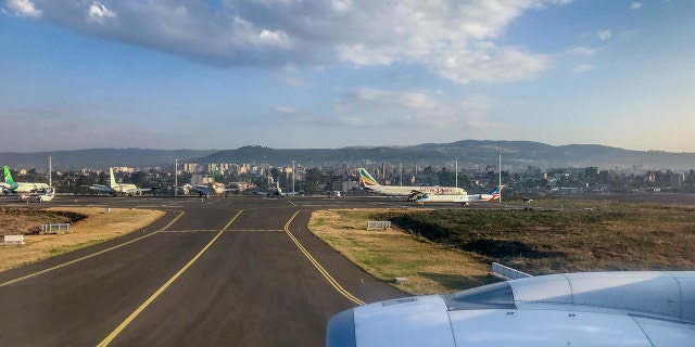 Planes sit on the tarmac at Bole International Airport in Addis Ababa, Ethiopia Wednesday, March 10, 2021. The United States Federal Aviation Administration warned pilots on Wednesday, Nov. 17, 2021, that planes operating at the airport could be "directly or indirectly exposed to ground weapons fire and/or surface-to-air fire," citing the "ongoing clashes" between Ethiopian forces and fighters from the northern Tigray region.