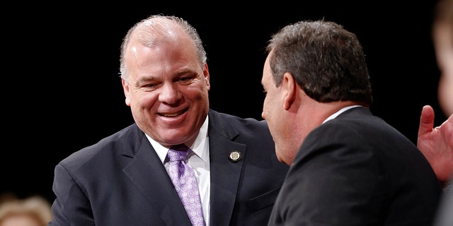 TRENTON, NJ - JANUARY 21:  New Jersey Senate President Steve Sweeney greets New Jersey Gov. Chris Christie prior to being sworn in for his second term on January 21, 2014 at the War Memorial in Trenton, New Jersey. Christie begins his second term amid controversy surrounding George Washington Bridge traffic and Hurricane Sandy relief distribution.  (Photo by Jeff Zelevansky/Getty Images)