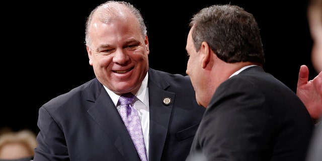 TRENTON, NJ - JANUARY 21: New Jersey Senate President Steve Sweeney greets New Jersey Gov. Chris Christie prior to being sworn in for his second term on January 21, 2014 at the War Memorial in Trenton, New Jersey. Christie begins his second term amid controversy surrounding George Washington Bridge traffic and Hurricane Sandy relief distribution. (Photo by Jeff Zelevansky/Getty Images)