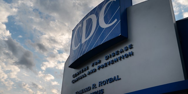 Signage stands outside the Centers for Disease Control and Prevention (CDC) headquarters in Atlanta, Georgia, U.S, on Saturday, March 14, 2020. 