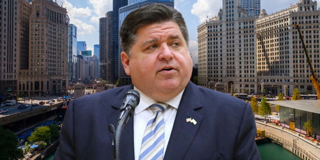 Gov. J.B. Pritzker speaks during a news conference at South Elgin High School on March 31, 2021.