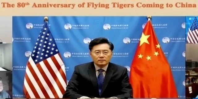 In this screenshot taken on Nov. 16, 2021 and released by Chinese People's Association of Friendship with Foreign Countries, Qin Gang, China's ambassador to the U.S. speaks during a video conference call on the 80th anniversary of Flying Tigers Coming to China event in Beijing, China. 