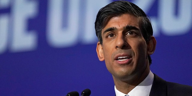 Rishi Sunak, then Britain's chancellor of the exchequer, makes a speech at the U.N. climate summit in Glasgow, Scotland, Nov. 3, 2021.